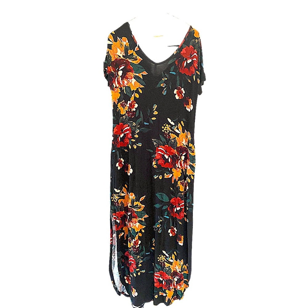 Black floral dress with open back. Loose fitting, Medium fit. Slits on sides.